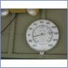 A big thermometer shows 118F